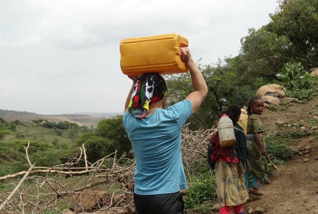 Helping locals carry their water in Ethiopia